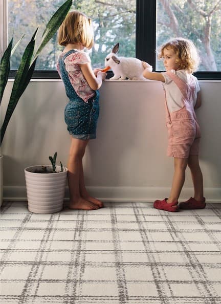 Children on patterned carpet feeding bunny | Carpets Of Dalton