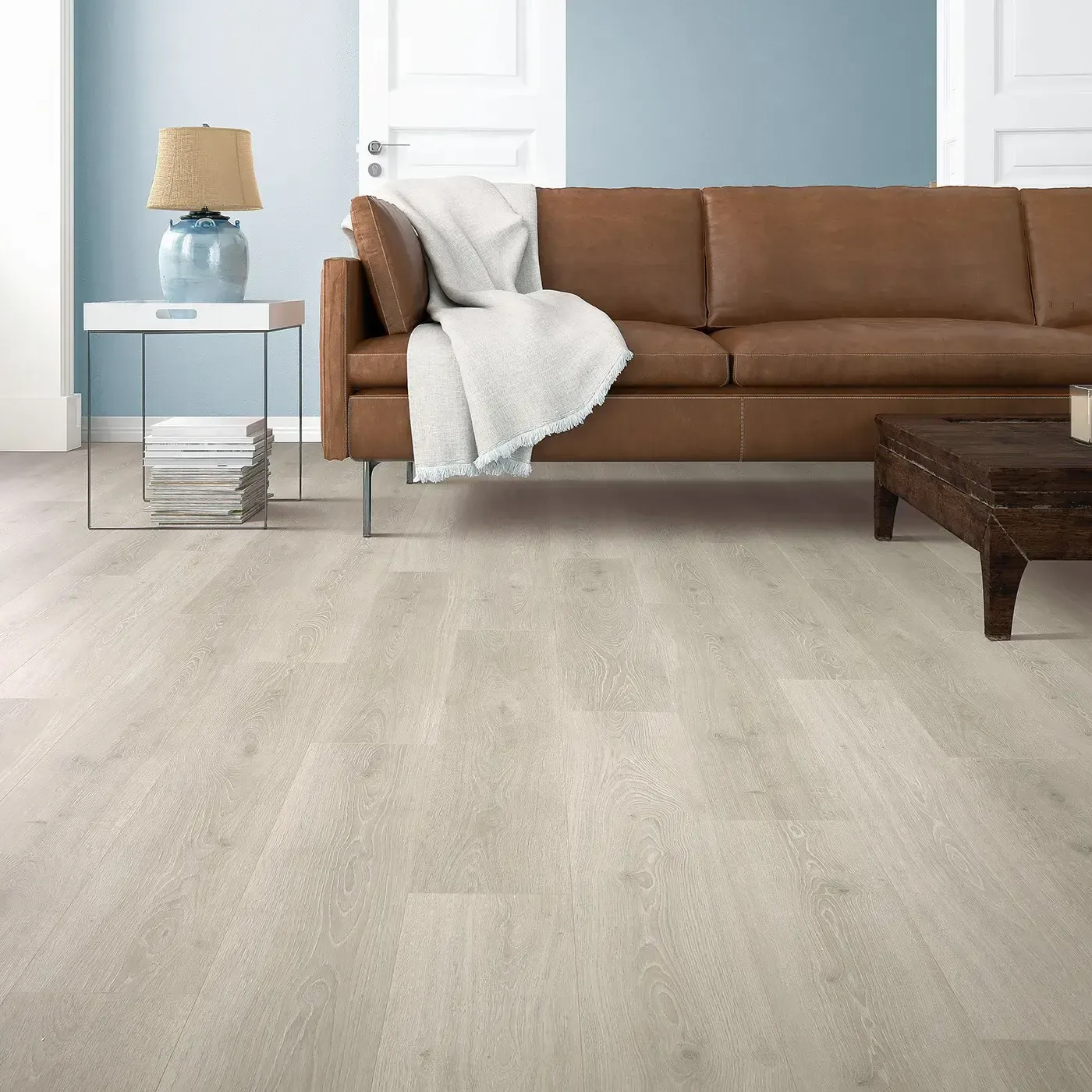 33634_03W_room-img Mohawk Laminate in a light, almost white wood tone in a living room | Carpets of Dalton