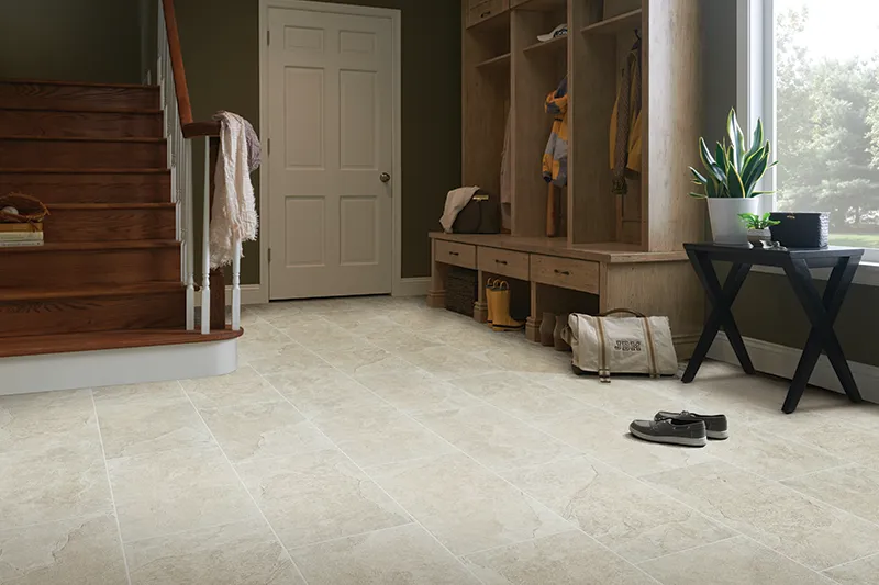 Sand colored tile in entryway | Carpets of Dalton