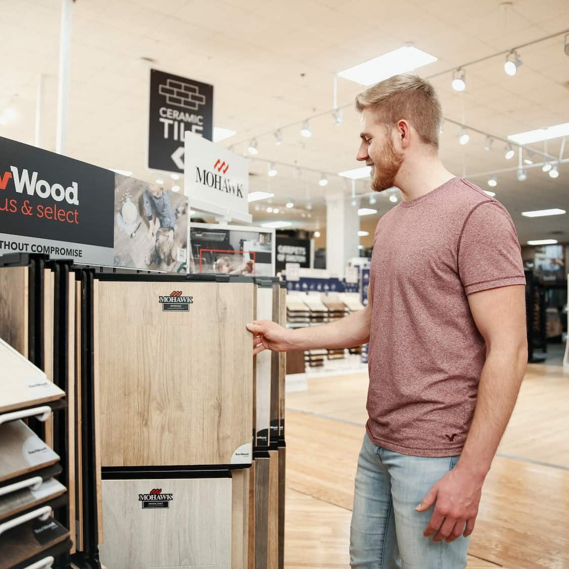Sales rep browsing through Revwood hardwood display